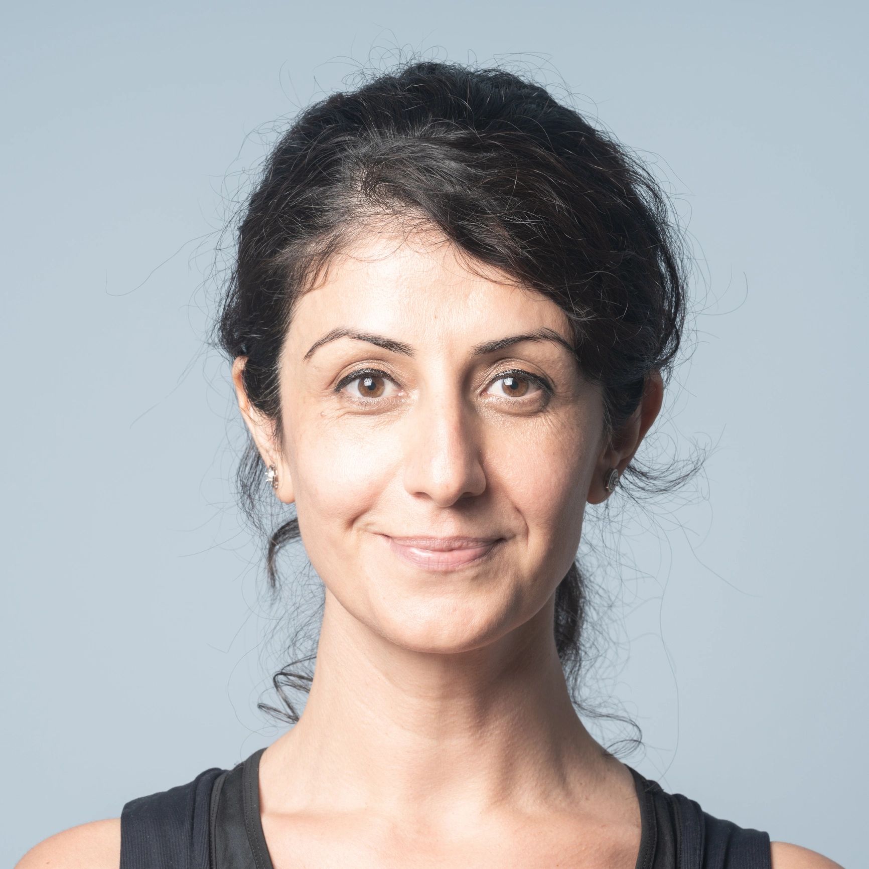 Portrait of a person with a gentle smile