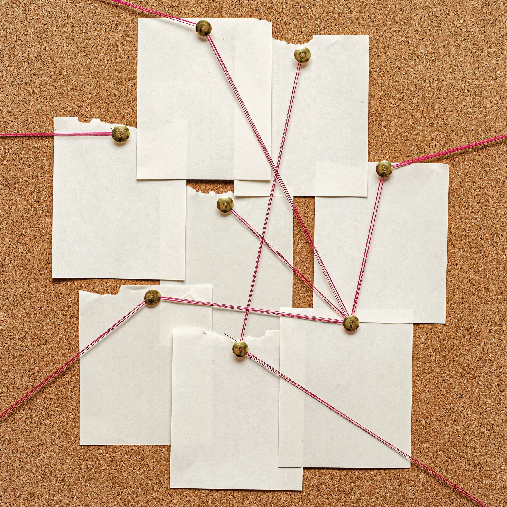 Cork board with pinned notes, representing shared community reminders